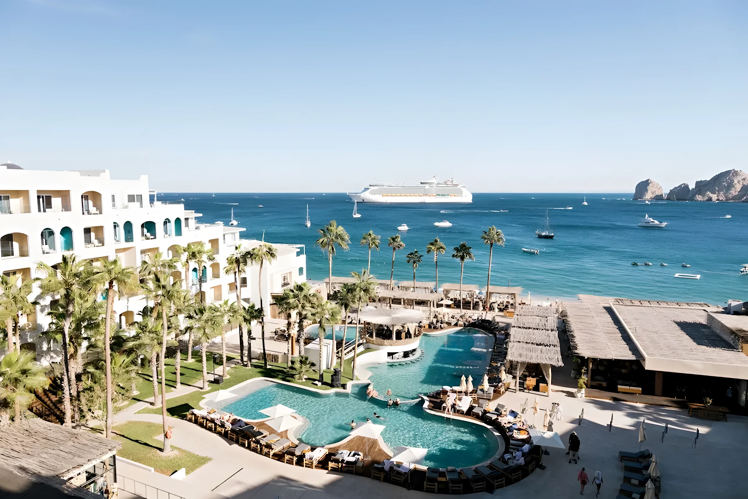 Pools and lounge chairs at ME Cabo on Playa El Medano in Cabo San Lucas